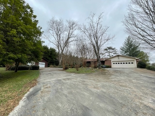 937 County Road 181 Decatur, TN 37322 - Photo 4 of 52 a view of a yard with a house and trees