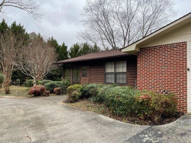 937 County Road 181 Decatur, TN 37322 - Photo 5 of 52 a view of backyard with potted plants and a large tree