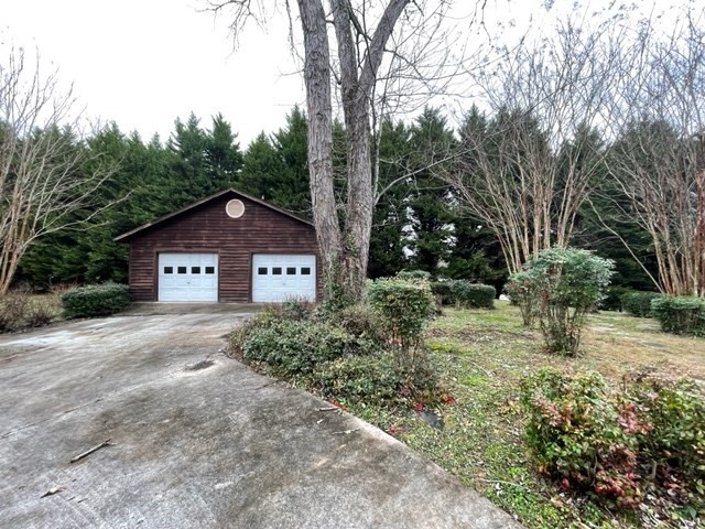 937 County Road 181 Decatur, TN 37322 - Photo 7 of 52 a view of house with yard and trees in the background