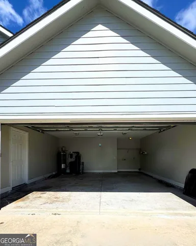 a kitchen with a sink and an oven