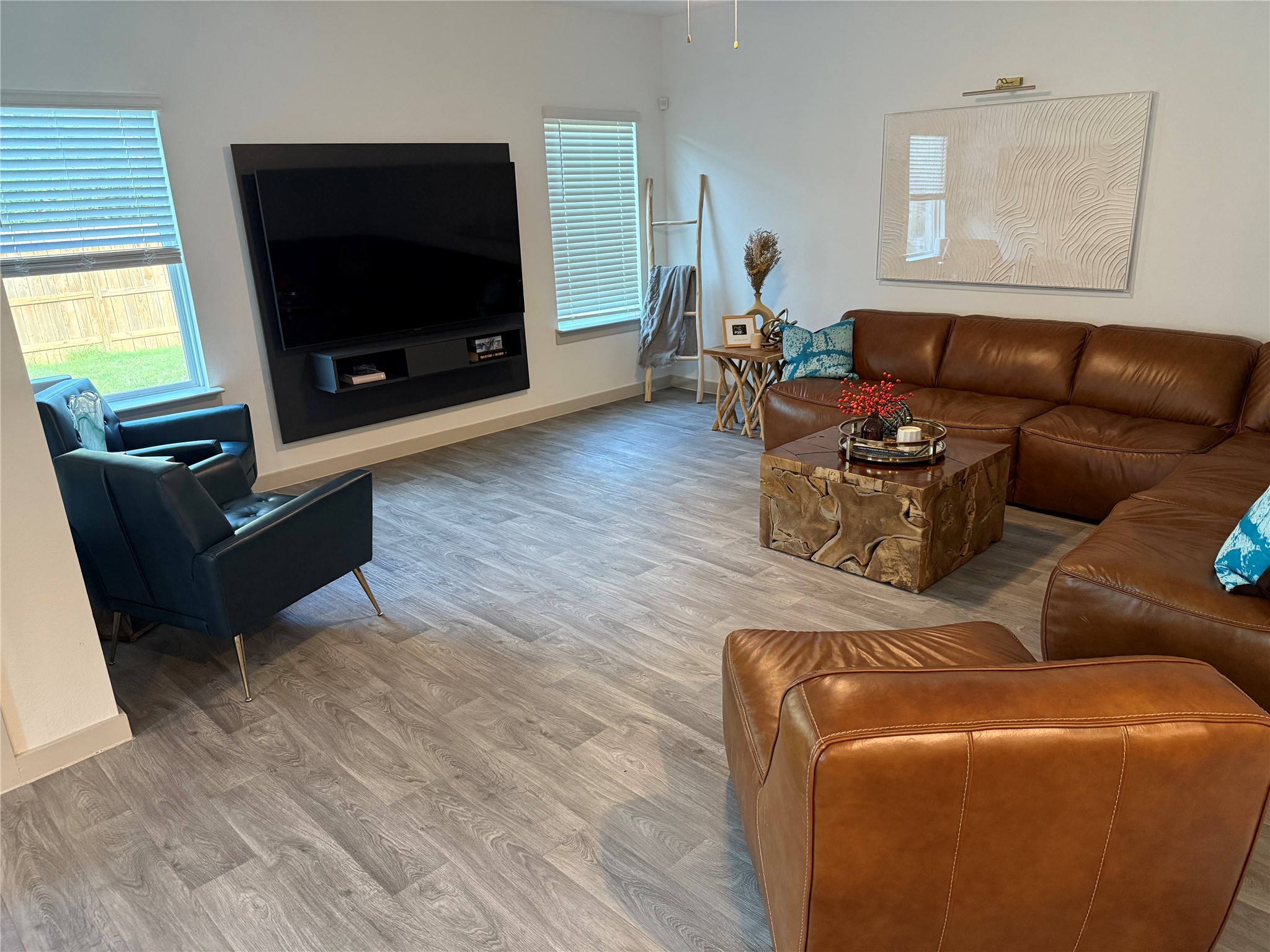 12823 Tokenhouse Lane Houston, TX 77047 - Photo 11 of 37 a living room with furniture and a flat screen tv