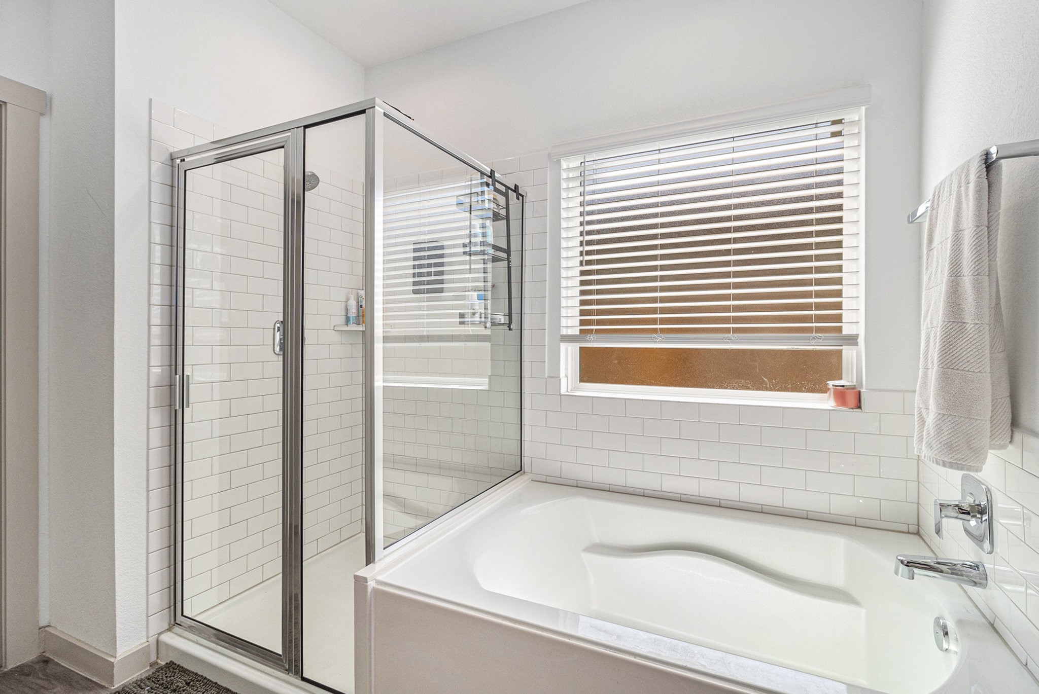 12823 Tokenhouse Lane Houston, TX 77047 - Photo 20 of 37 a bathroom with a bathtub and a shower