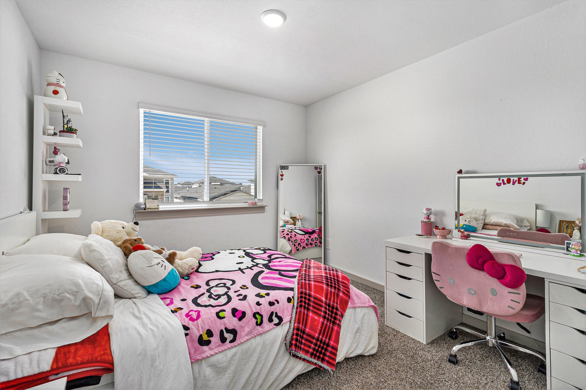 12823 Tokenhouse Lane Houston, TX 77047 - Photo 23 of 37 a bedroom with a bed and furniture