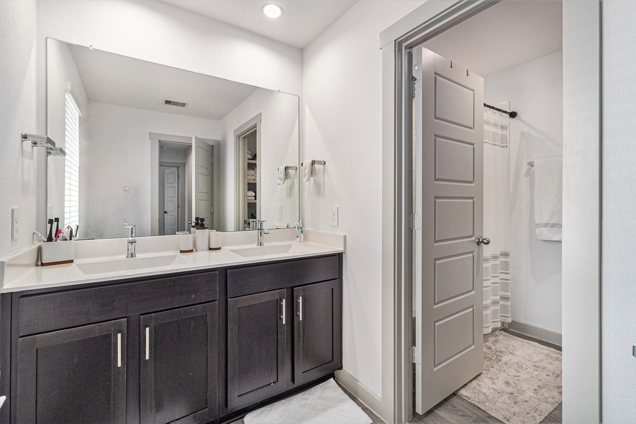 12823 Tokenhouse Lane Houston, TX 77047 - Photo 25 of 37 a bathroom with a double vanity sink mirror and double