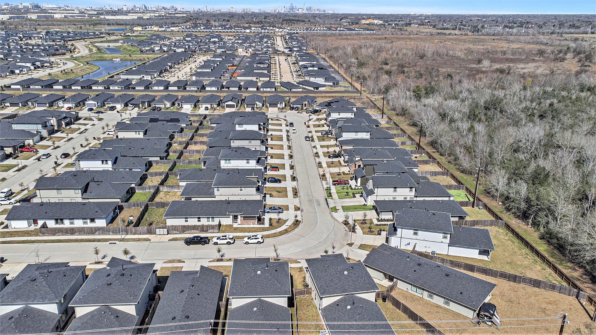 12823 Tokenhouse Lane Houston, TX 77047 - Photo 35 of 37 an aerial view of a city with mountain view
