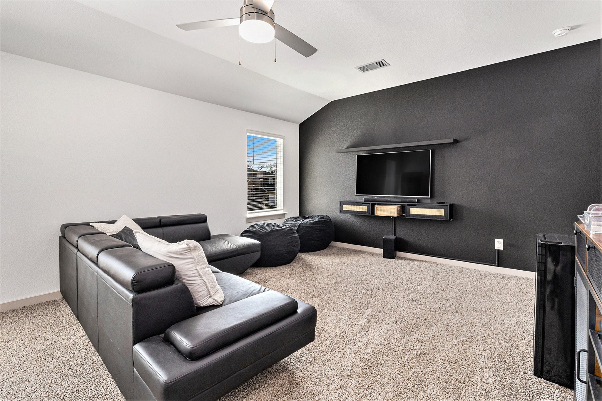 12823 Tokenhouse Lane Houston, TX 77047 - Photo 4 of 37 a living room with furniture and a flat screen tv