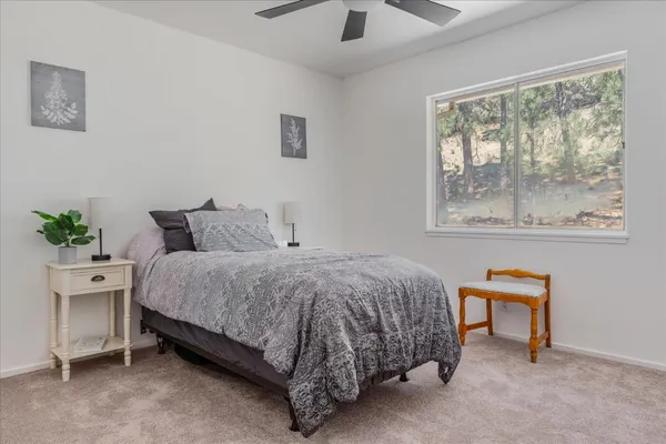 a workspace with furniture and a window