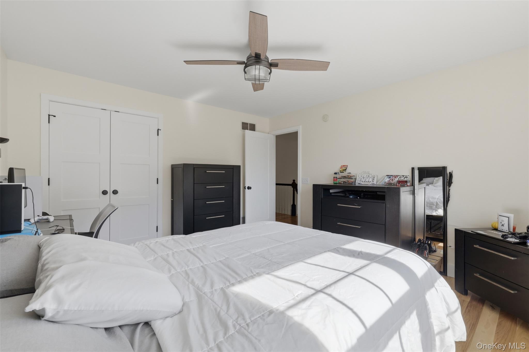 233 Devon Farms Road Stormville, NY 12582 - Photo 33 of 48 a bed room with a bed and a television
