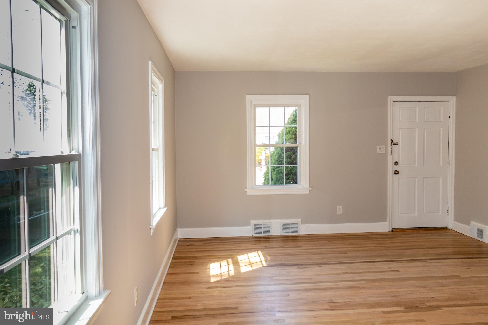 26 Byron Avenue Hamilton, NJ 08610 - Photo 16 of 33 a view of empty room with wooden floor and fan