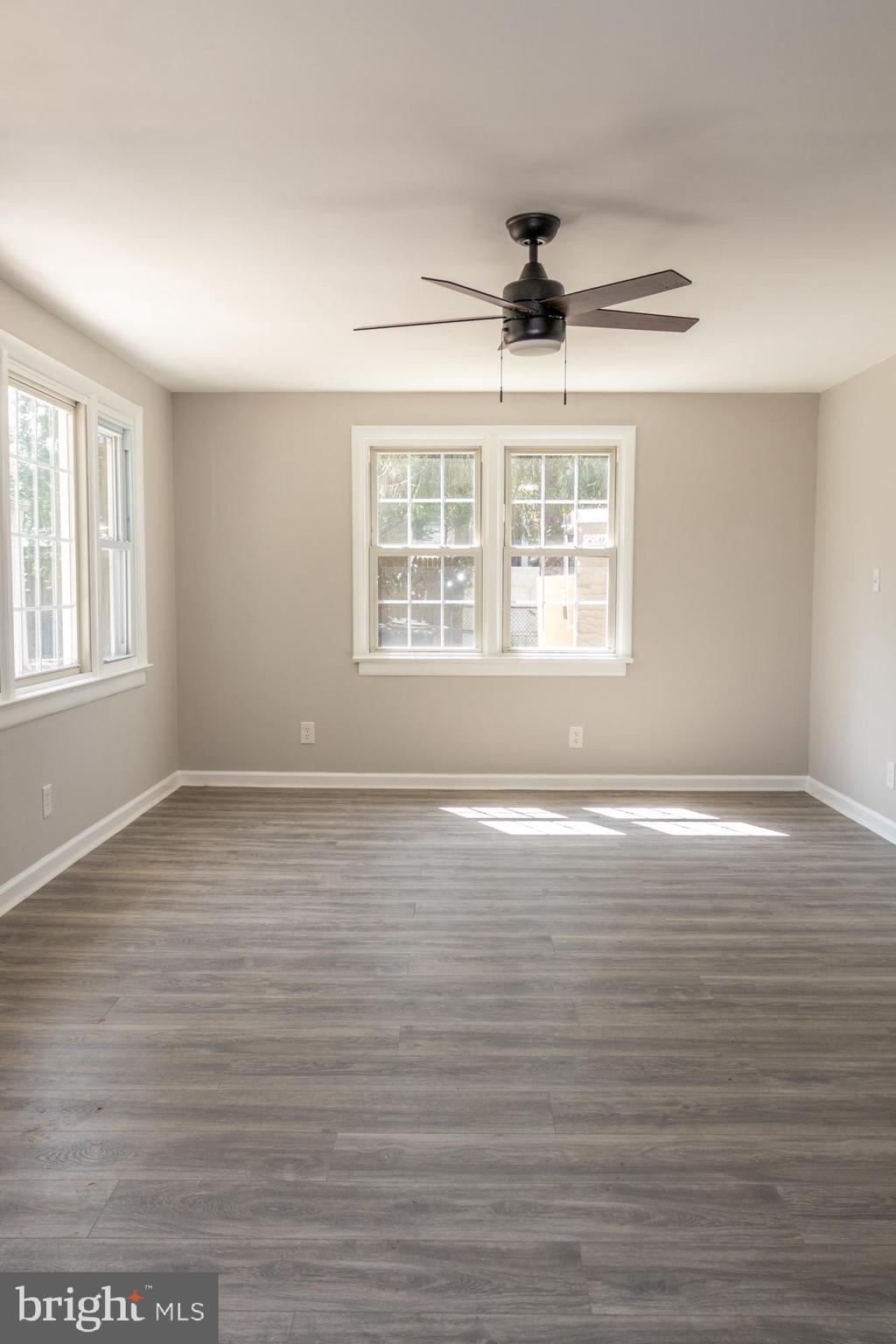 26 Byron Avenue Hamilton, NJ 08610 - Photo 21 of 33 an empty room with wooden floor and windows