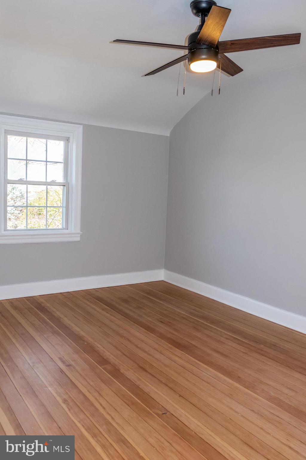 26 Byron Avenue Hamilton, NJ 08610 - Photo 26 of 33 wooden floor in an empty room with a window
