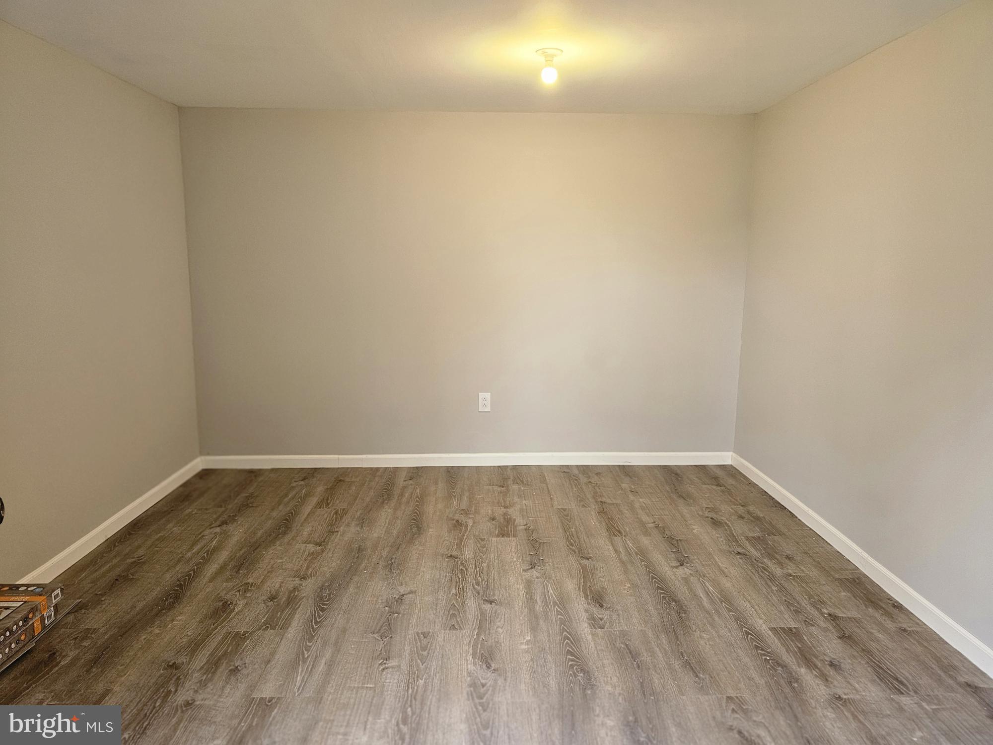 26 Byron Avenue Hamilton, NJ 08610 - Photo 6 of 33 a view of an empty room with wooden floor