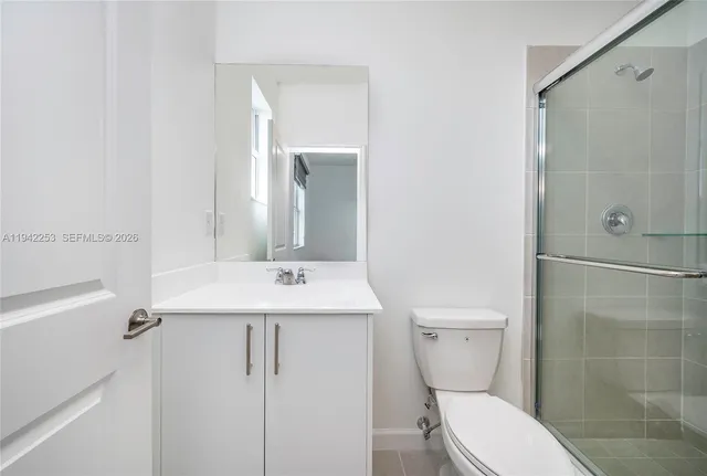 a view of storage and utility room with washer and dryer