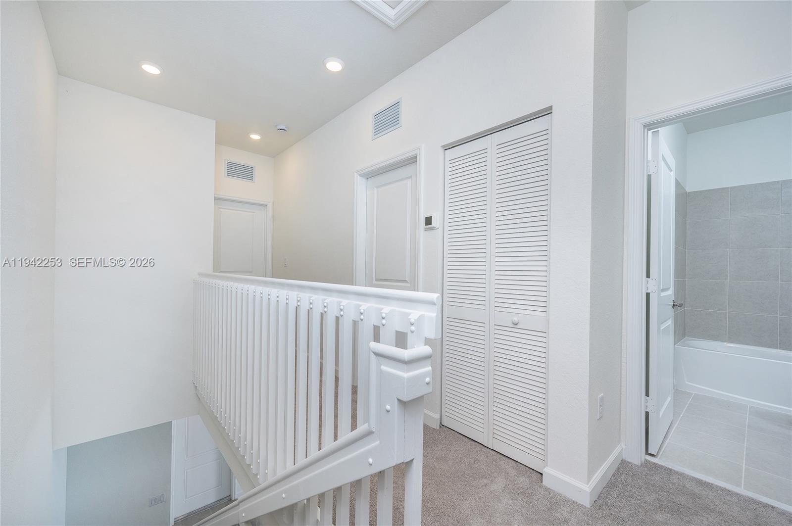 2747 Southeast 26th Road, Unit 2747 Homestead, FL 33035 - Photo 24 of 27 a bathroom with a shower and tub