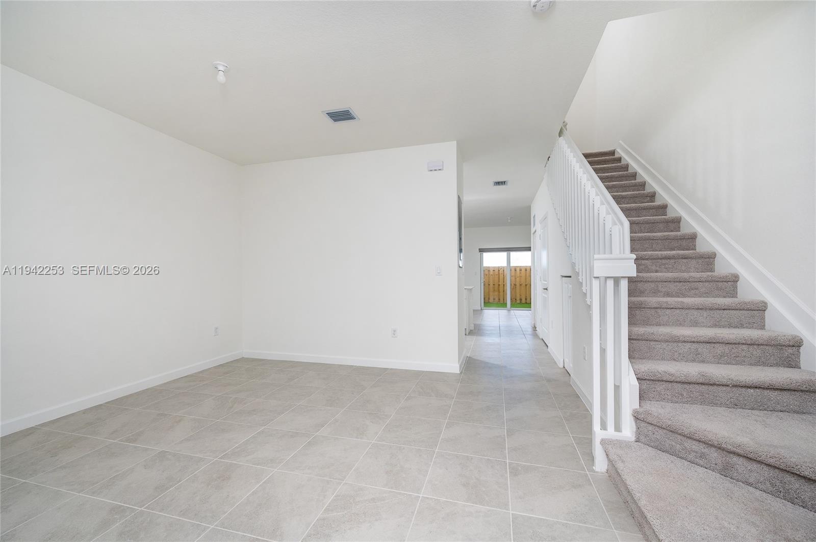 2747 Southeast 26th Road, Unit 2747 Homestead, FL 33035 - Photo 6 of 27 a view of entryway and hall