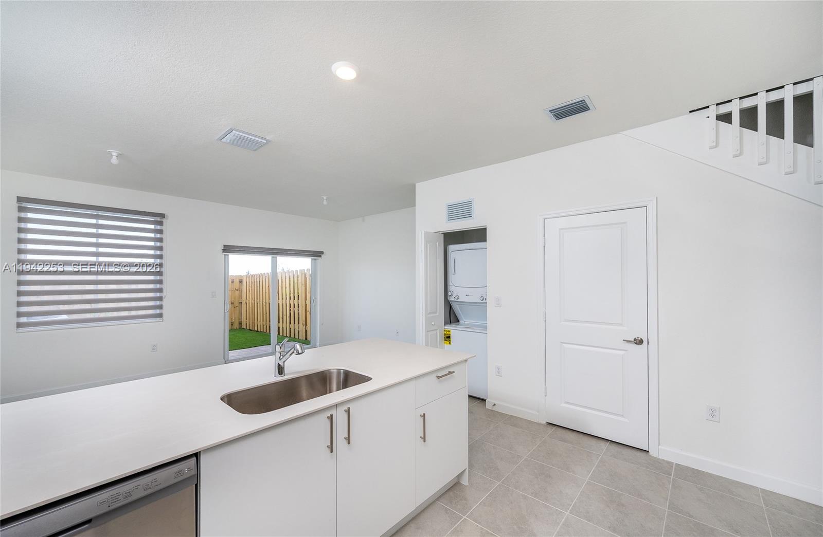 2747 Southeast 26th Road, Unit 2747 Homestead, FL 33035 - Photo 7 of 27 a bathroom with a sink and a mirror