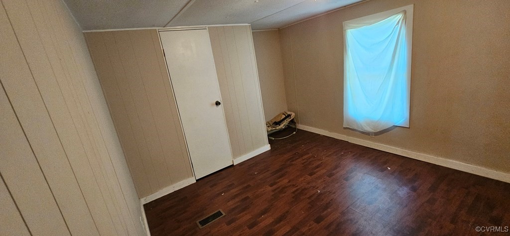 2718 Germantown Road Keysville, VA 23947 - Photo 6 of 16 Unfurnished bedroom featuring wood finished floors