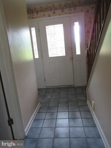a view of a kitchen with a window