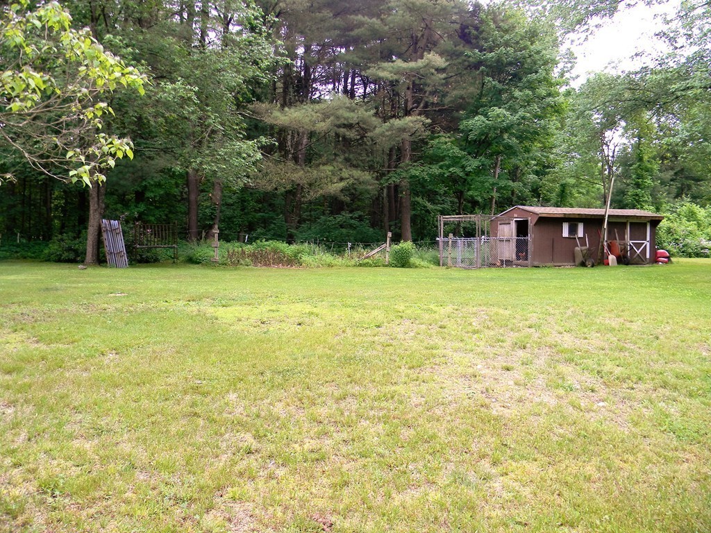 18 Flat Rock Road Petersham, MA 01366 - Photo 21 of 26 a view of a house with a yard