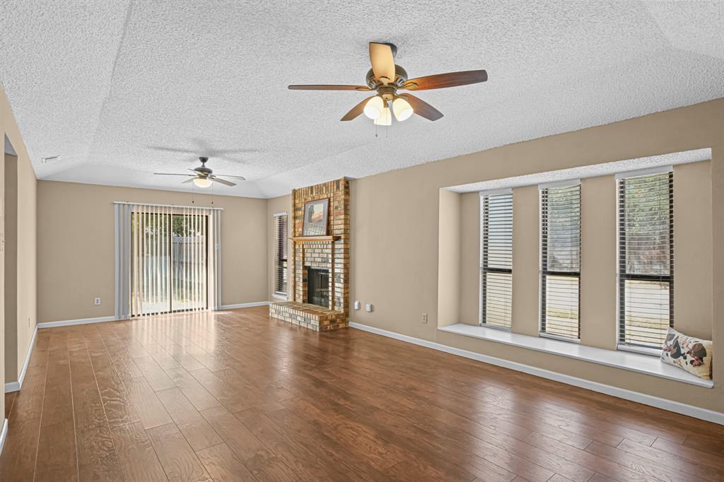 2134 Reverchon Drive Arlington, TX 76017 - Photo 3 of 23 Views to enjoy the outdoors, wood buring fireplace .
