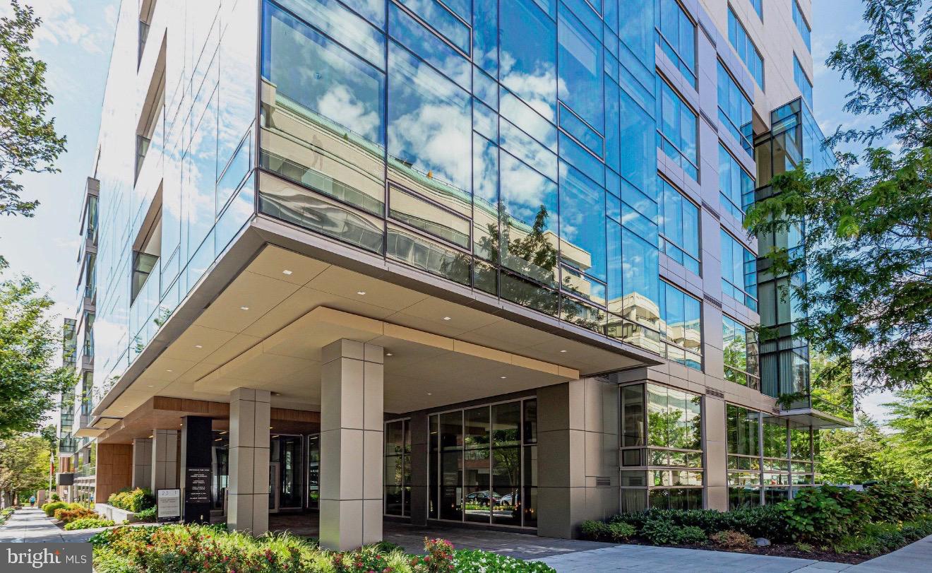 Sleek modern architecture with reflective glass.