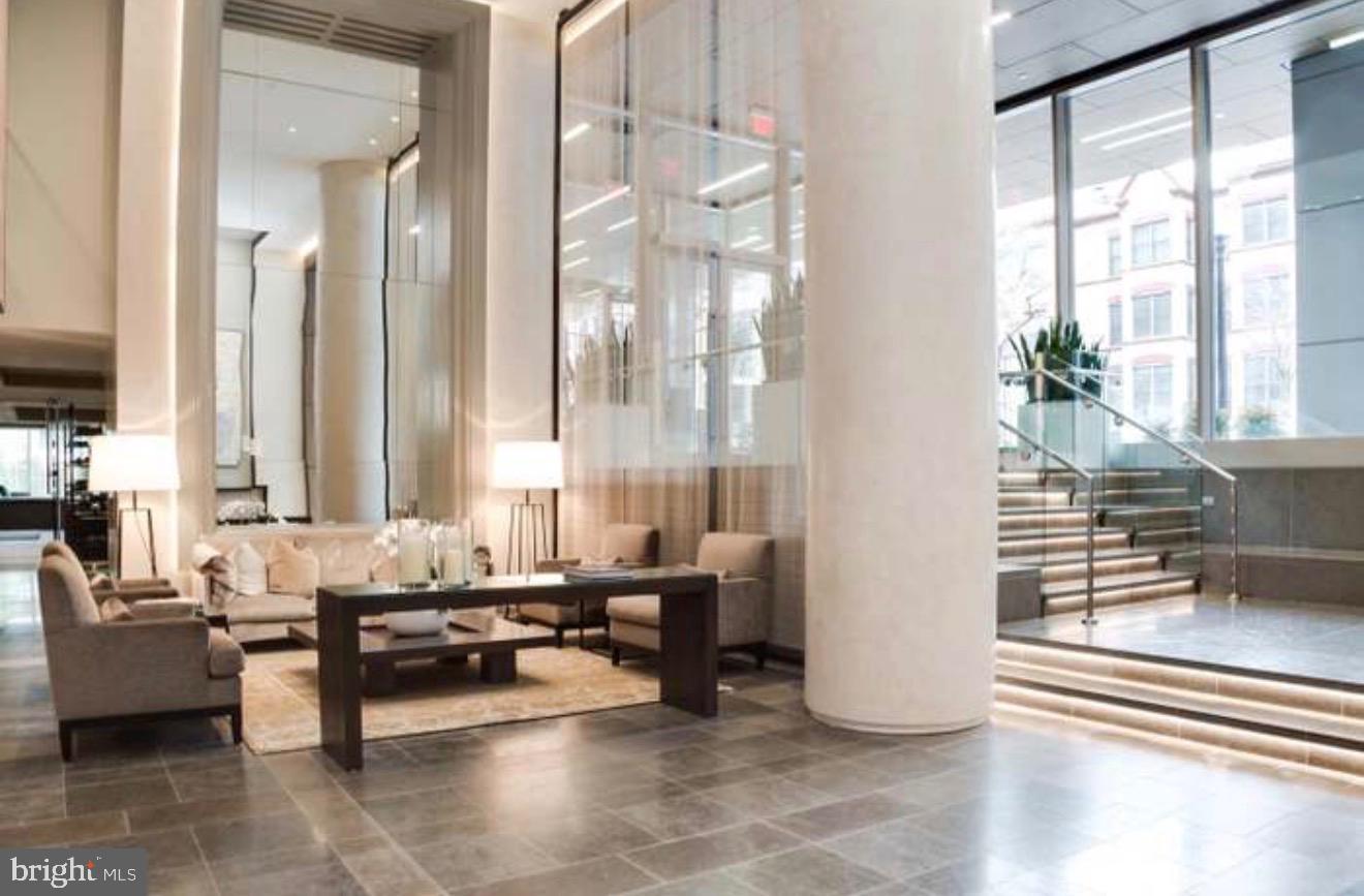 2501 M Street Northwest, Unit 722 Washington, DC 20037 - Photo 14 of 23 Modern elegance in a bright, airy lobby.