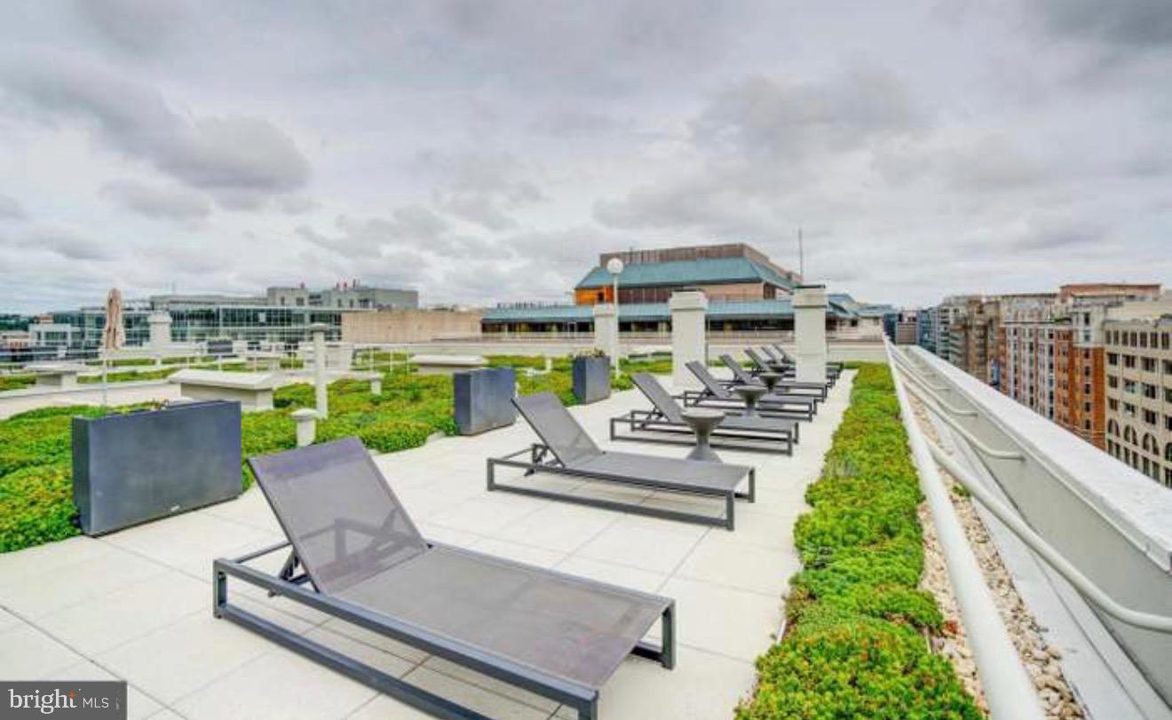 2501 M Street Northwest, Unit 722 Washington, DC 20037 - Photo 15 of 23 Rooftop oasis with city skyline views.