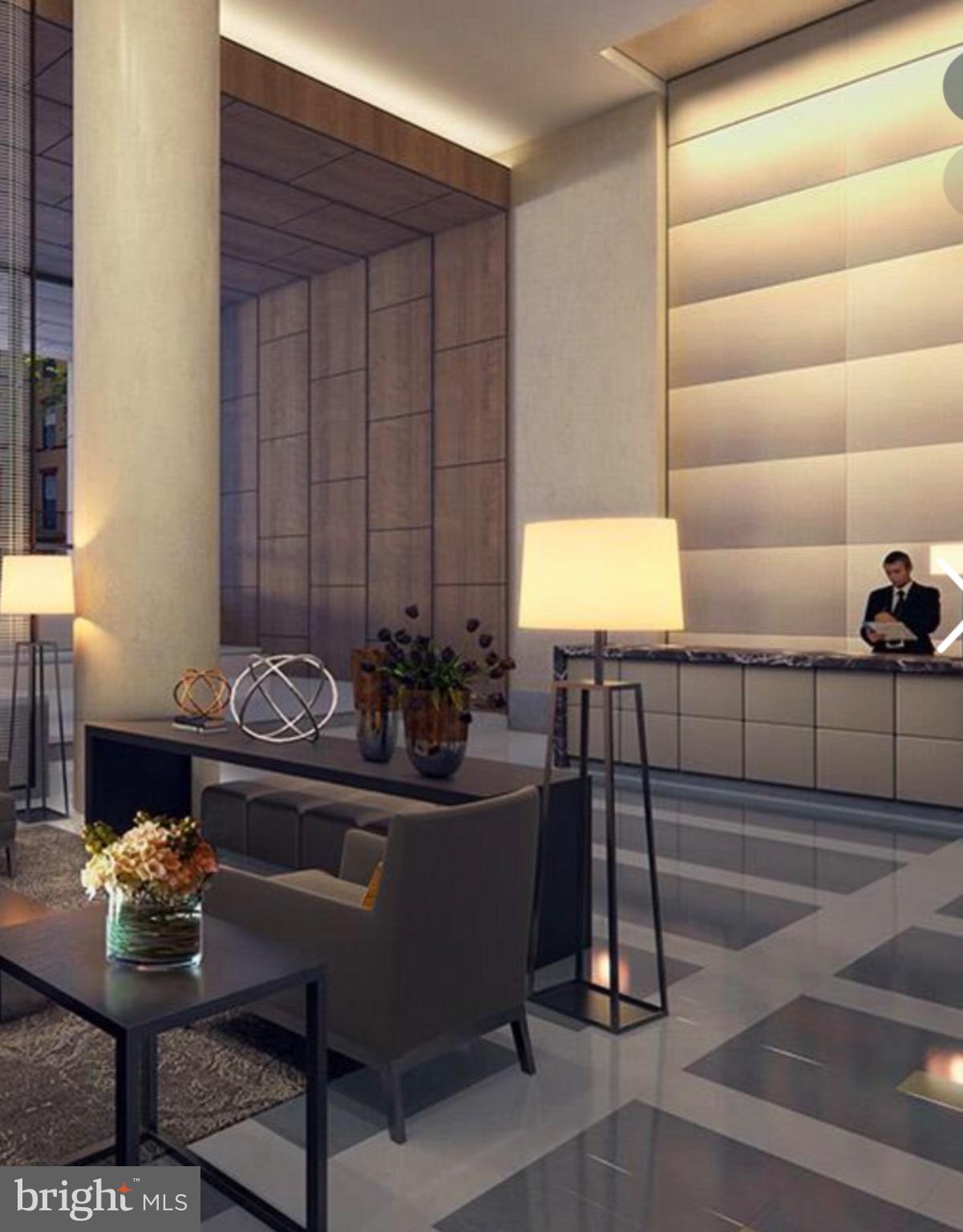 2501 M Street Northwest, Unit 722 Washington, DC 20037 - Photo 17 of 23 Elegant lobby with modern design elements.