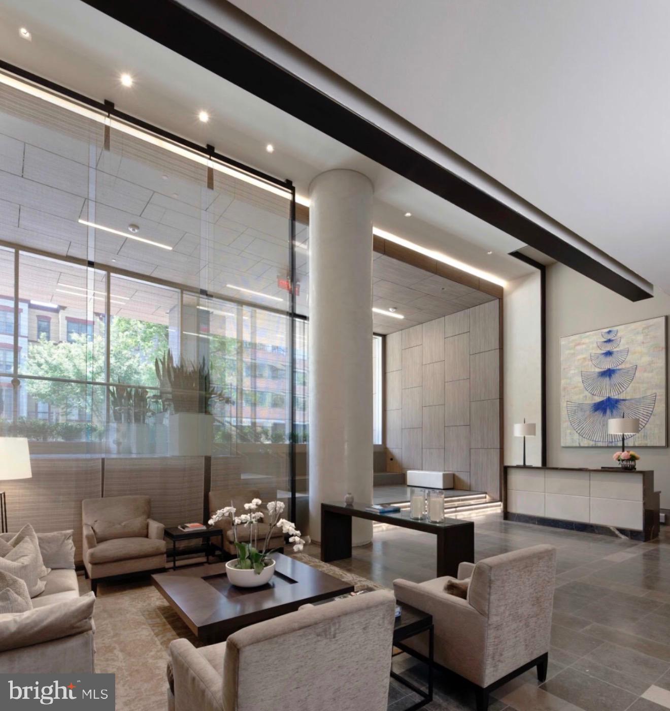 2501 M Street Northwest, Unit 722 Washington, DC 20037 - Photo 20 of 23 Modern elegance in a bright, airy lobby.