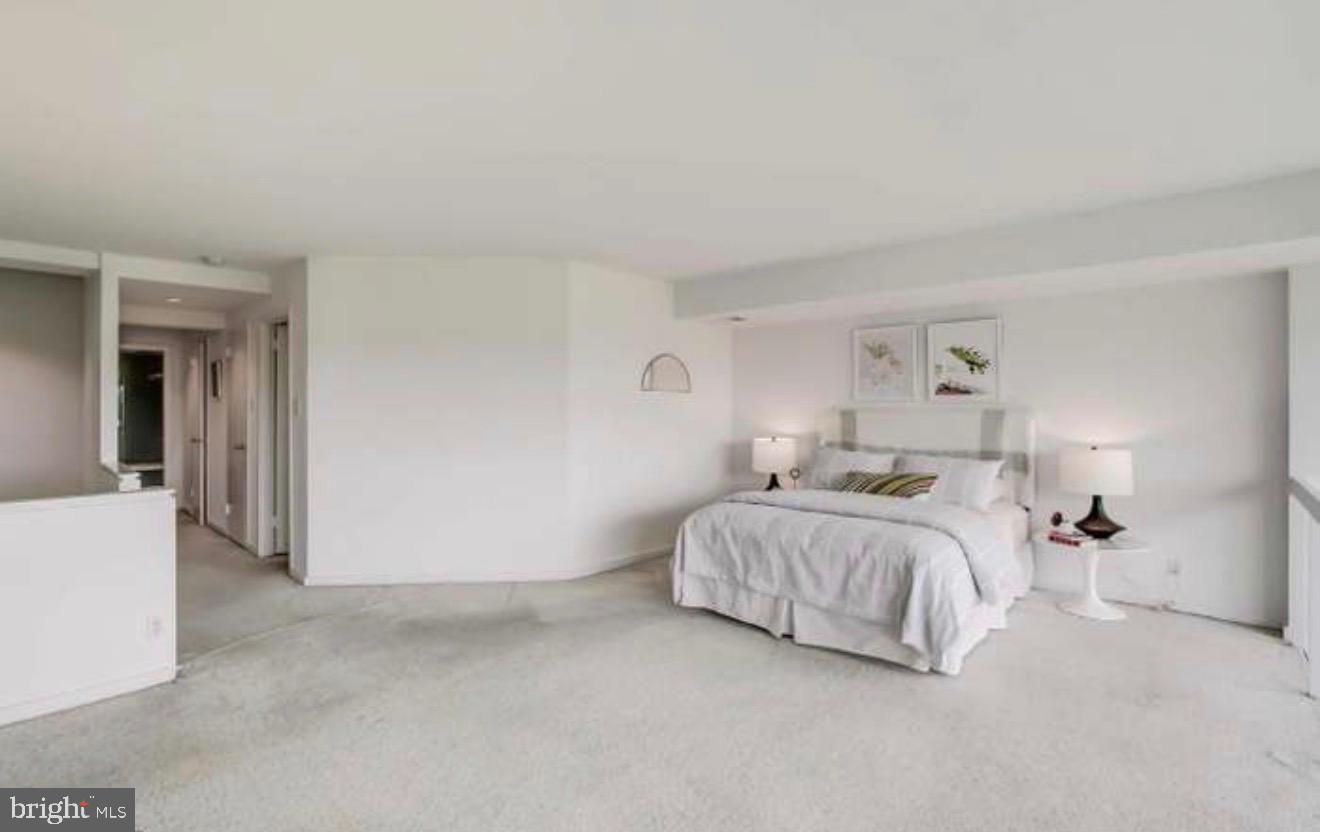 2501 M Street Northwest, Unit 722 Washington, DC 20037 - Photo 8 of 23 Spacious bedroom with serene ambiance.