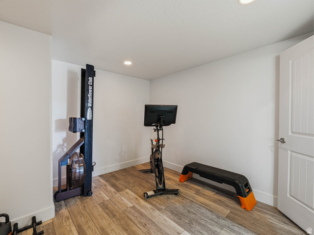 402 Shadow Hill Road Wanship, UT 84017 - Photo 53 of 90 Workout area featuring light wood-type flooring and recessed lighting