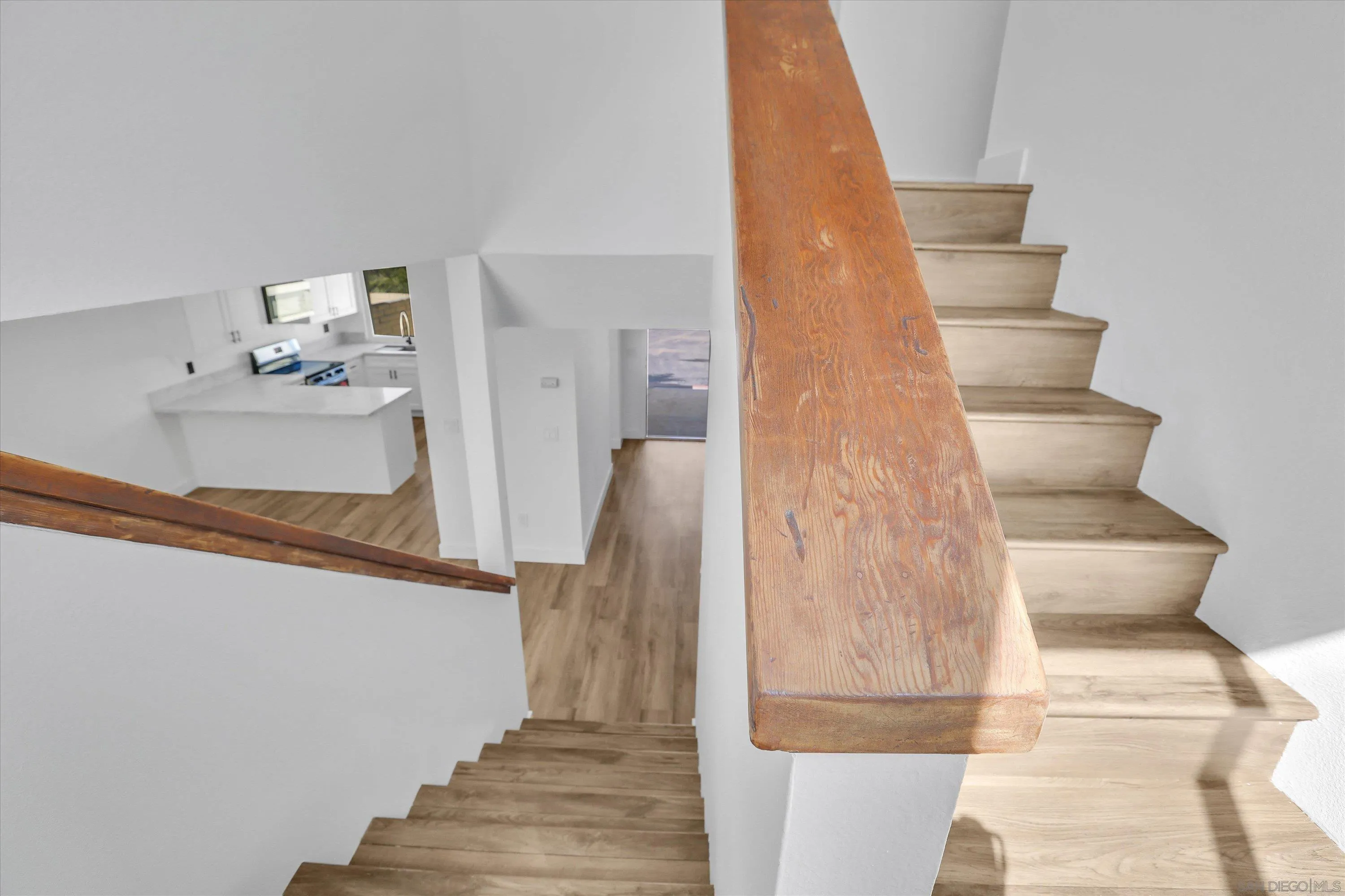 75 3rd Avenue, Unit 22 Chula Vista, CA 91910 - Photo 17 of 23 a view of entryway and hall with wooden floor