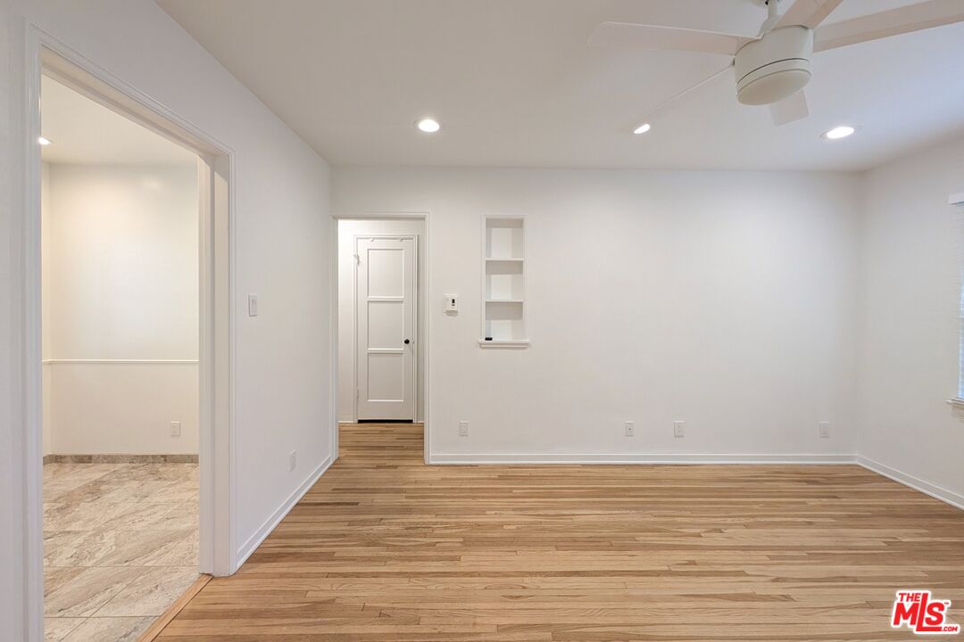 1030 5th Street, Unit C Santa Monica, CA 90403 - Photo 12 of 16 a view of a room with wooden floor