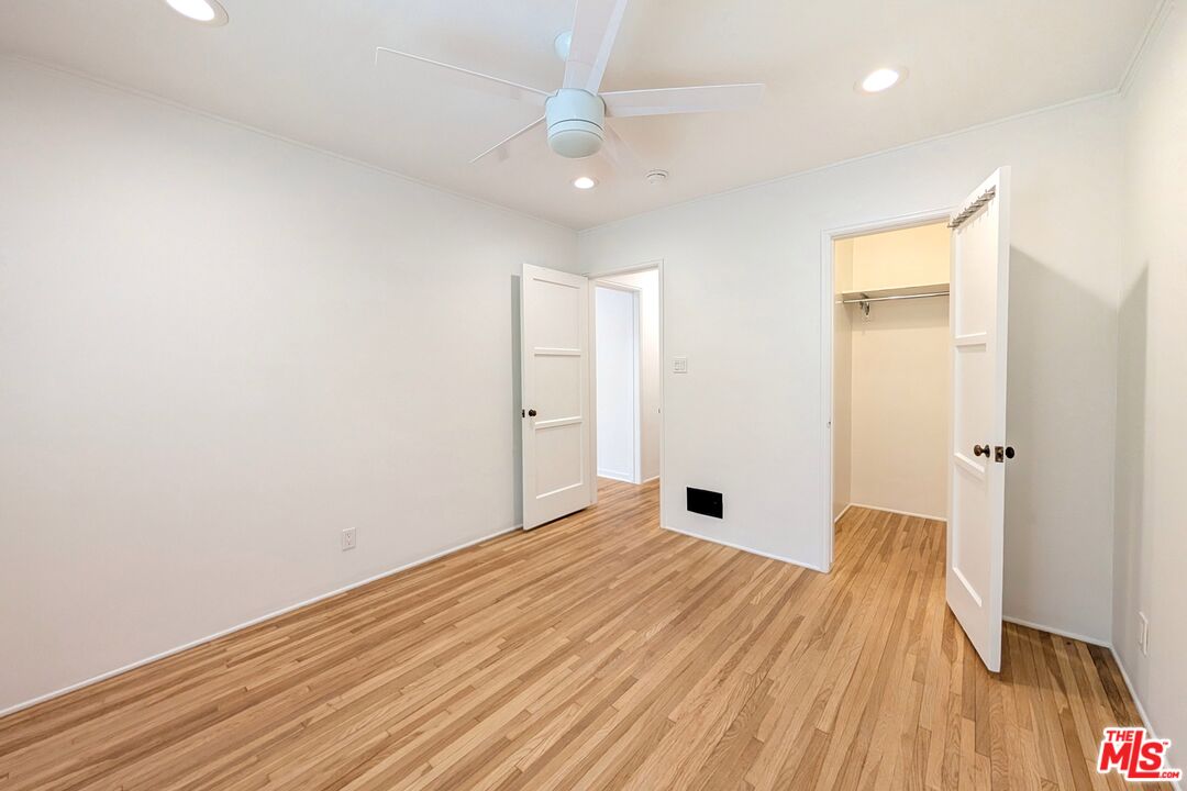 1030 5th Street, Unit C Santa Monica, CA 90403 - Photo 2 of 16 a view of a big room with wooden floor and windows