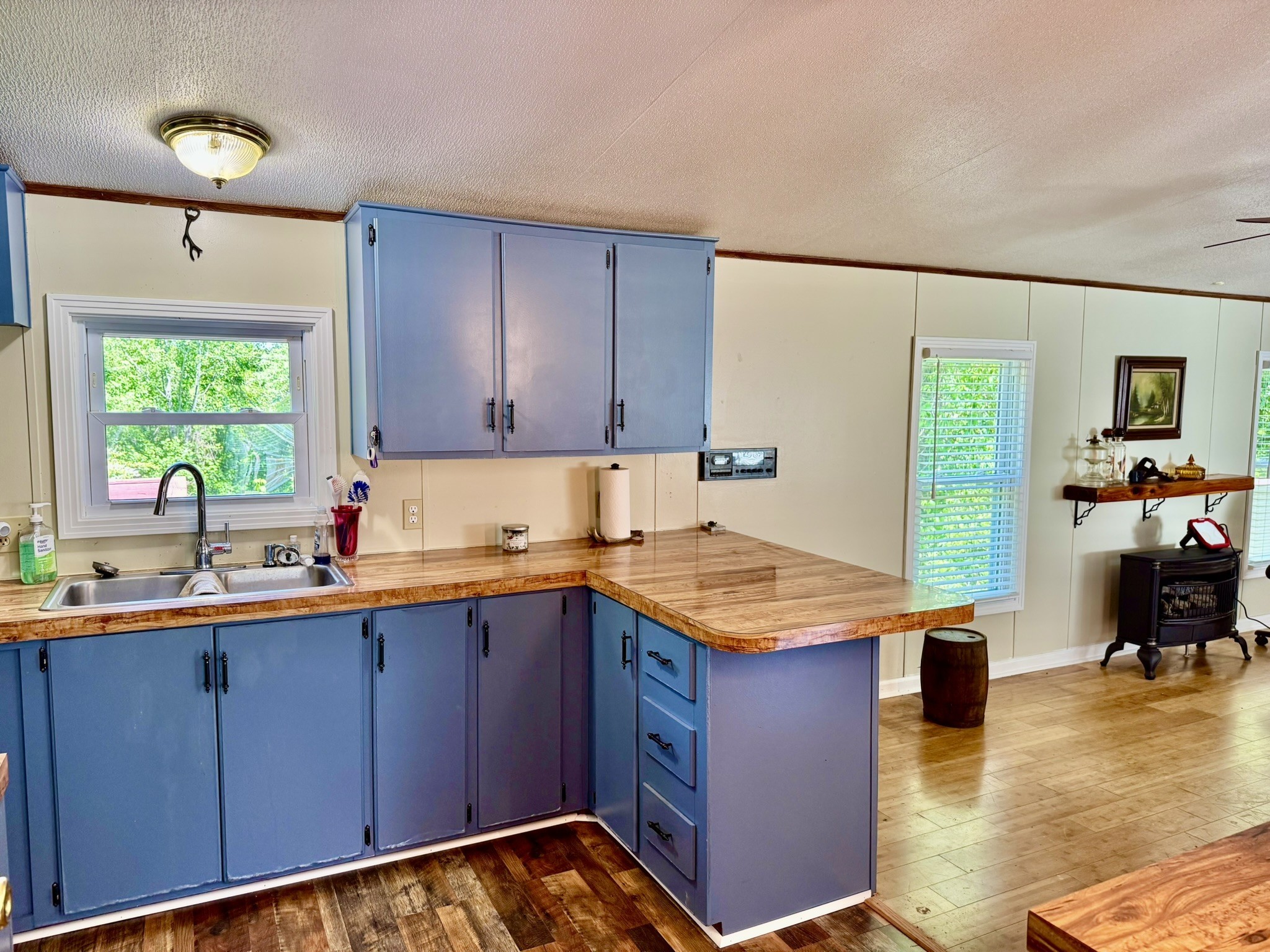 46 Bluff Point Ridge Road Waverly, TN 37185 - Photo 11 of 15 a kitchen with a sink and cabinets