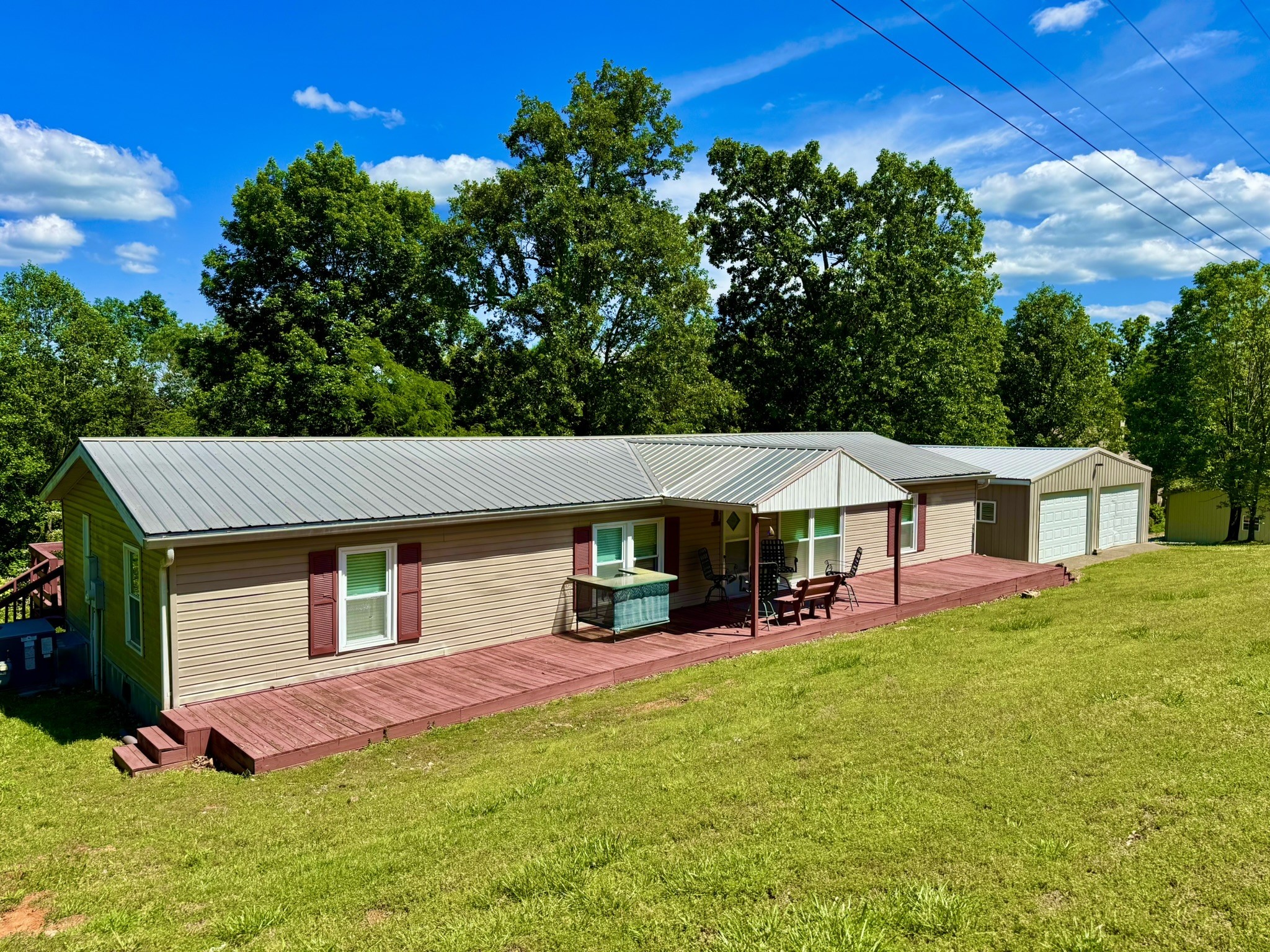 46 Bluff Point Ridge Road Waverly, TN 37185 - Photo 3 of 15 front view of a house with a yard