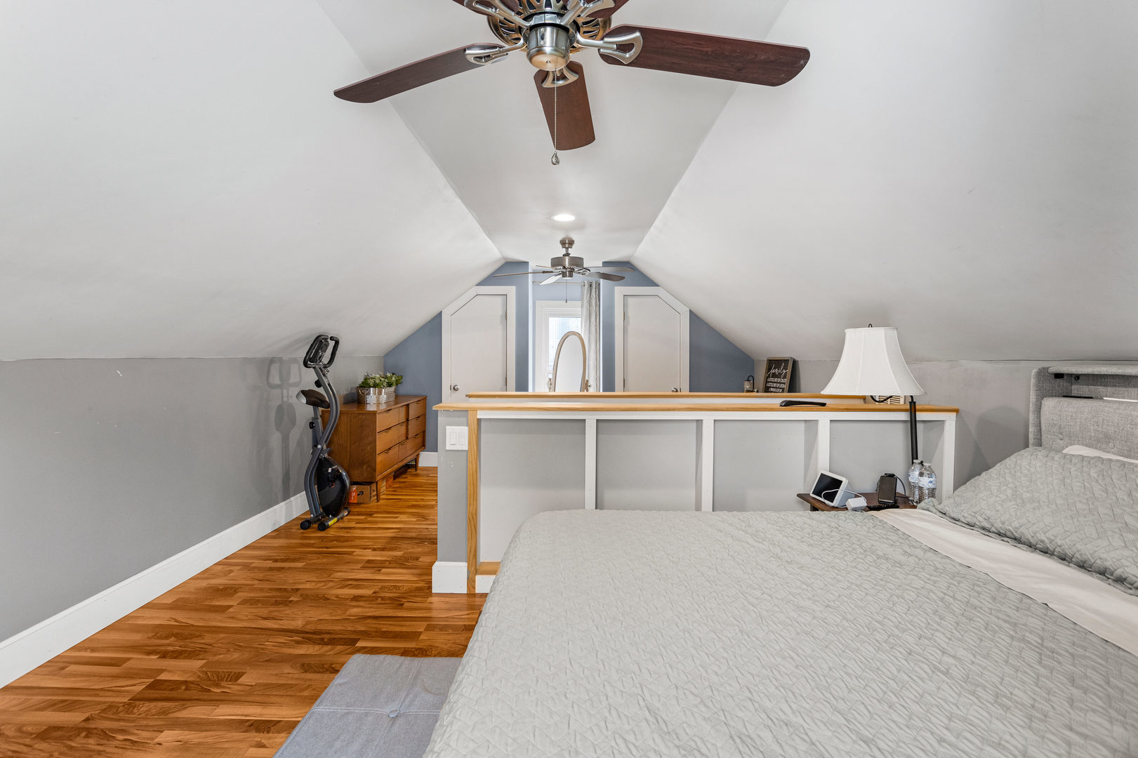 306 Shimp Road Milmine, IL 61855 - Photo 24 of 31 a bed room with a bed and a chandelier