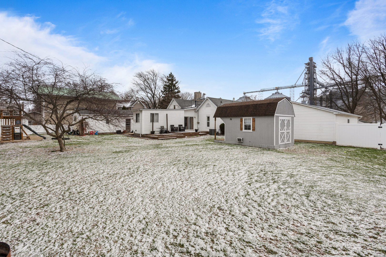 306 Shimp Road Milmine, IL 61855 - Photo 25 of 31 a view of a house with a snow