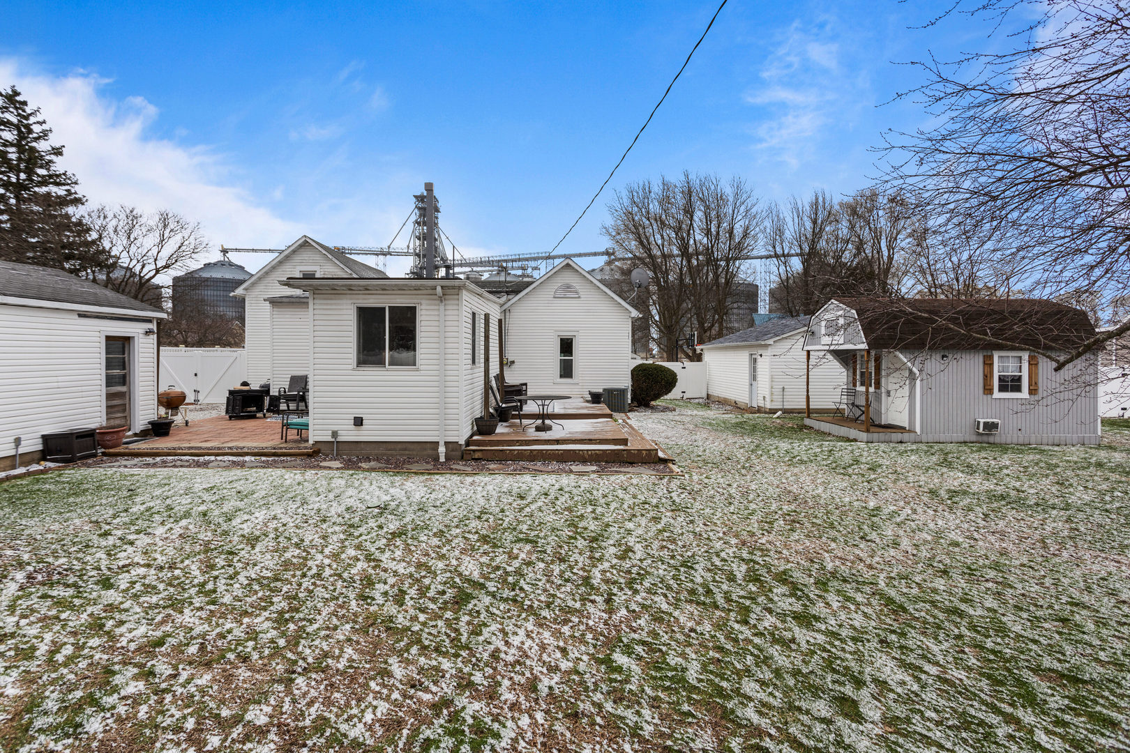 306 Shimp Road Milmine, IL 61855 - Photo 26 of 31 a view of a house with a yard