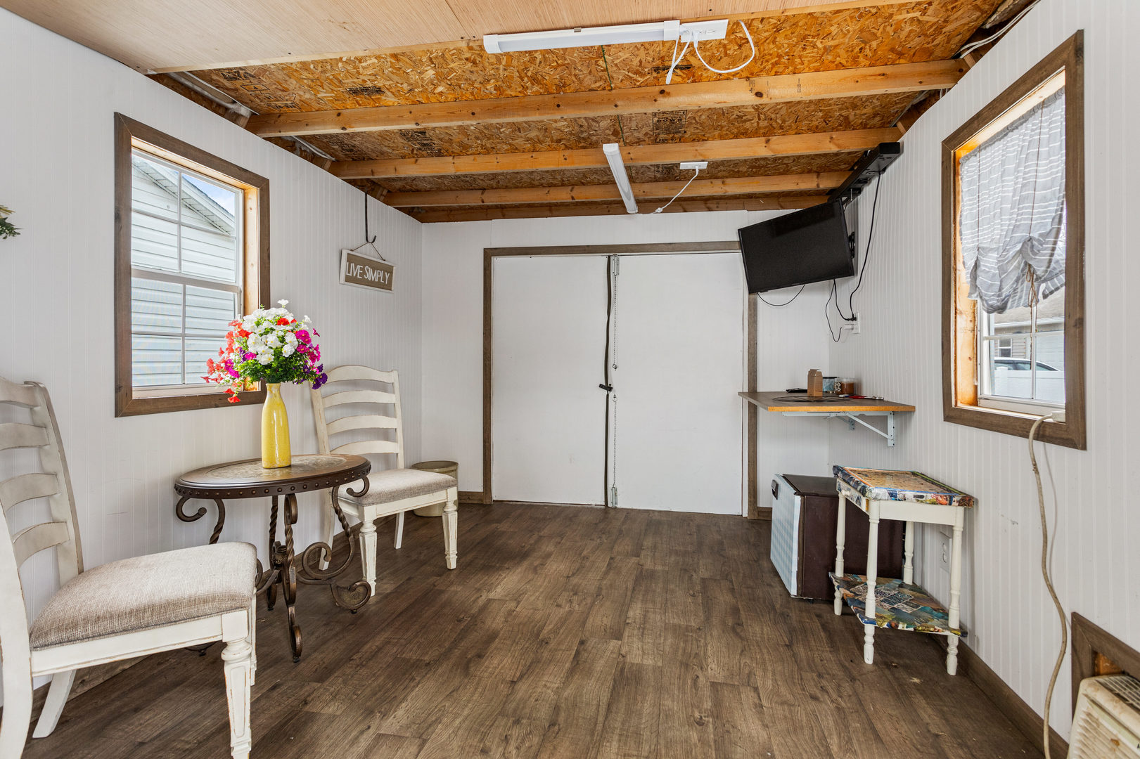 306 Shimp Road Milmine, IL 61855 - Photo 29 of 31 a livingroom with furniture and wooden floor