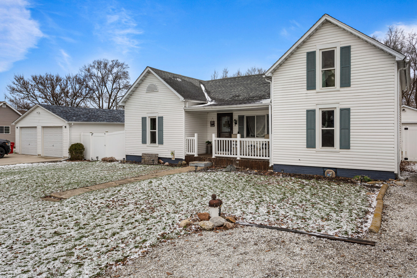 306 Shimp Road Milmine, IL 61855 - Photo 4 of 31 a house view with a backyard