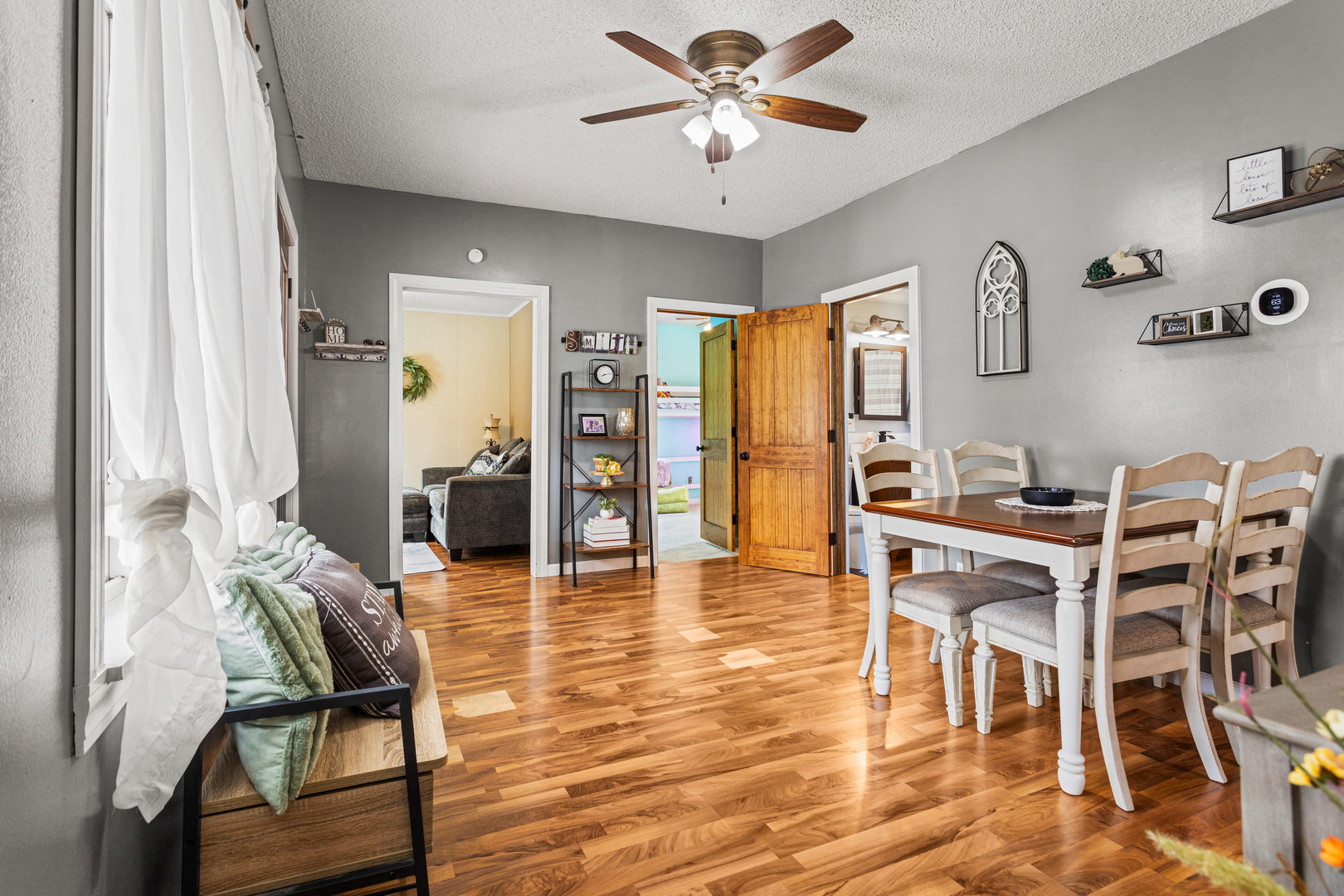 306 Shimp Road Milmine, IL 61855 - Photo 6 of 31 a view of a dining room with furniture and wooden floor