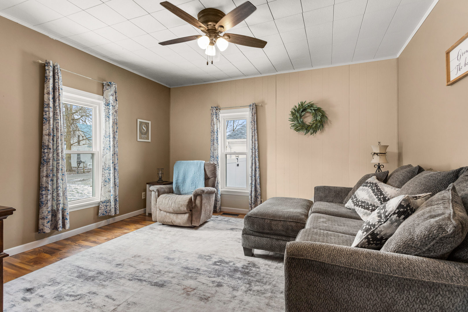 306 Shimp Road Milmine, IL 61855 - Photo 7 of 31 a living room with furniture and a large window