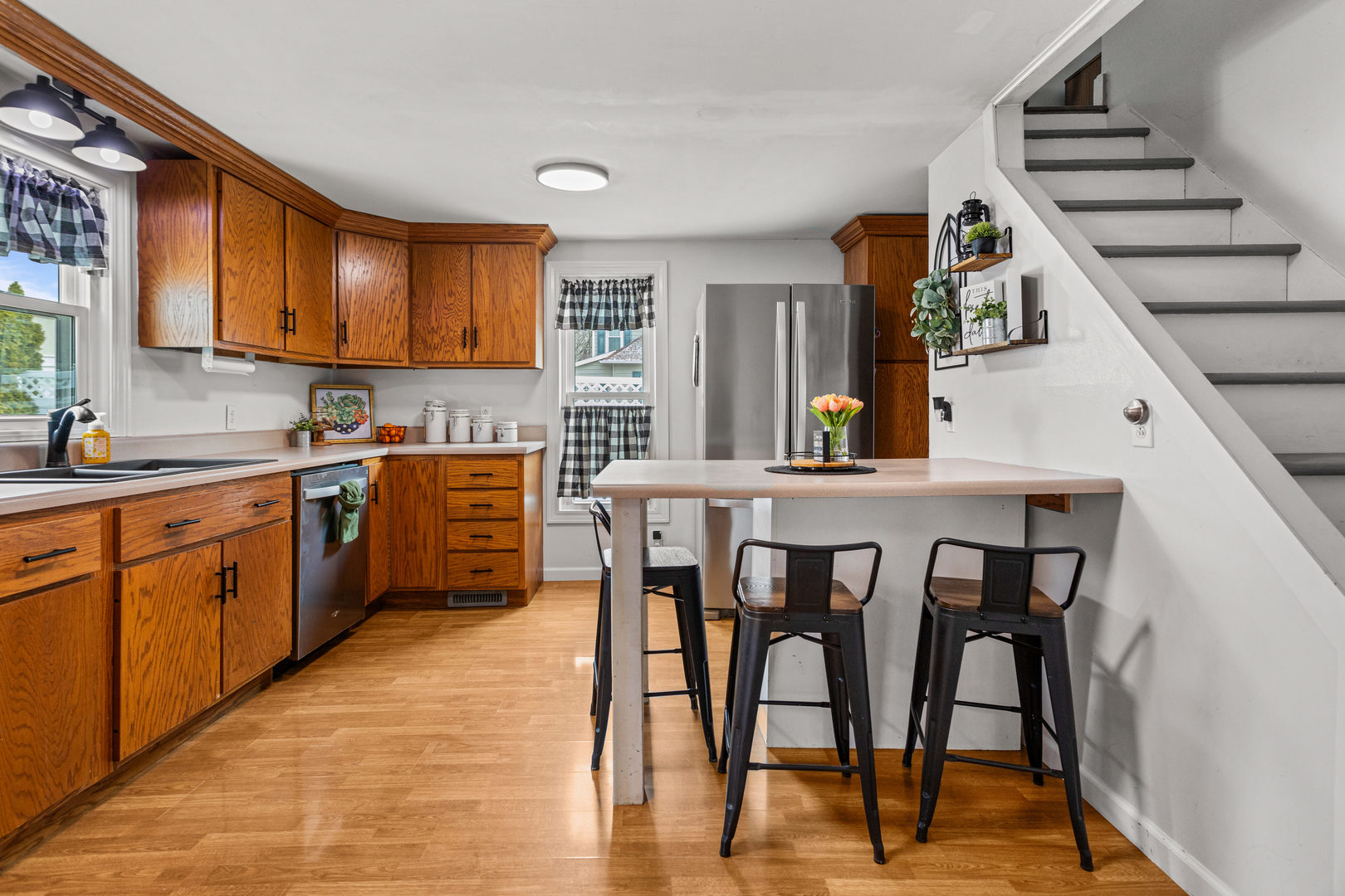 306 Shimp Road Milmine, IL 61855 - Photo 10 of 31 a kitchen with a table chairs sink and cabinets