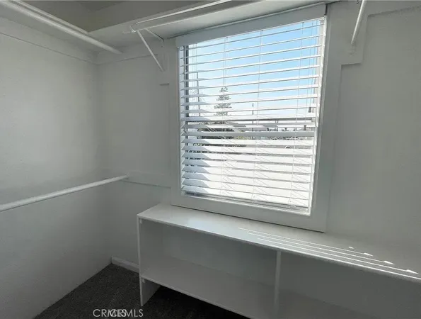 a bathroom with a window and a window