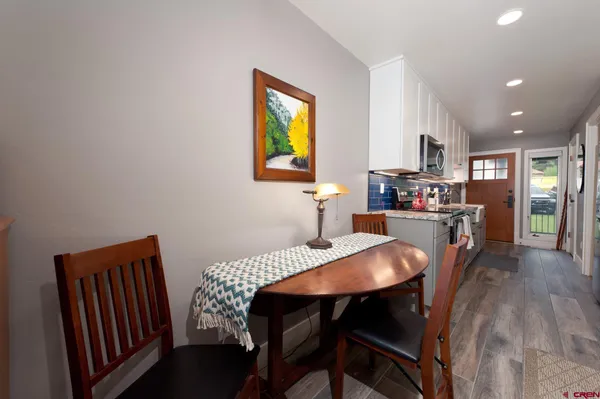 a view of a dining room with furniture