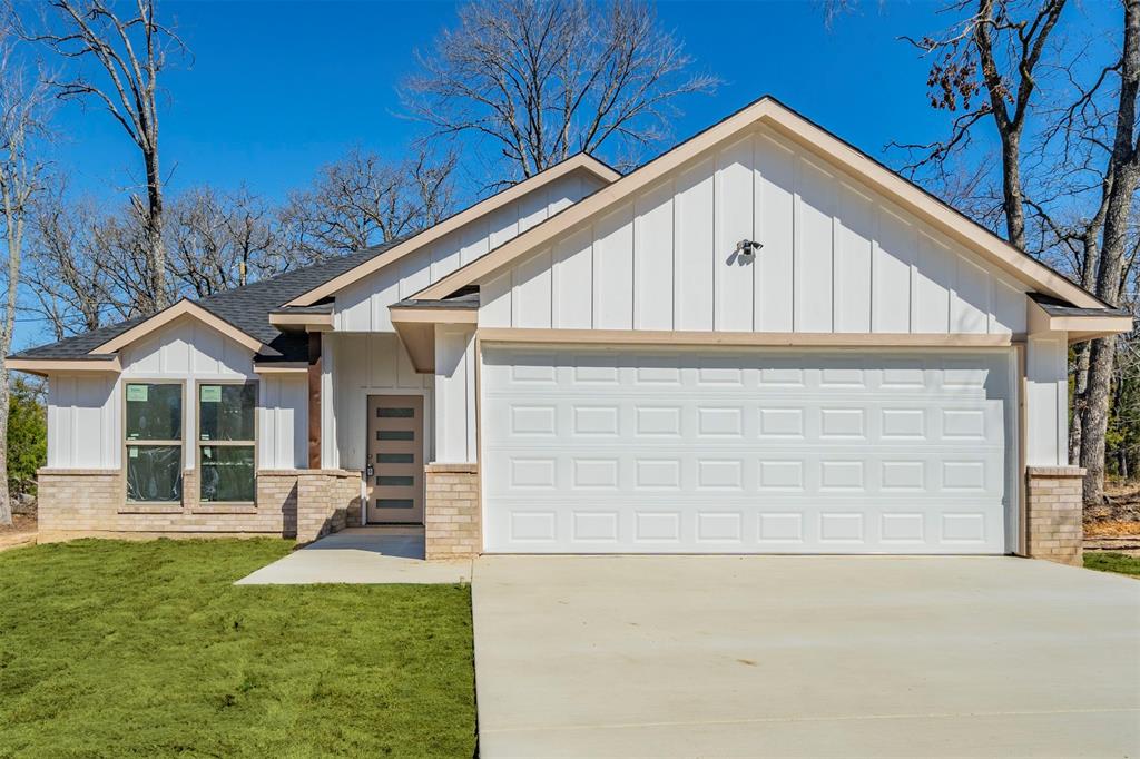 6130 Aztec Drive Mabank, TX 75156 - Photo 31 of 31 a view of house with backyard