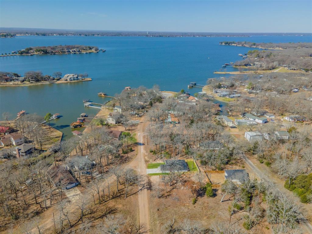 6130 Aztec Drive Mabank, TX 75156 - Photo 4 of 31 a view of a lake with beach