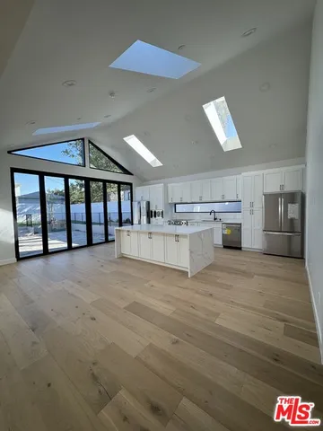 a view of a kitchen with a sink