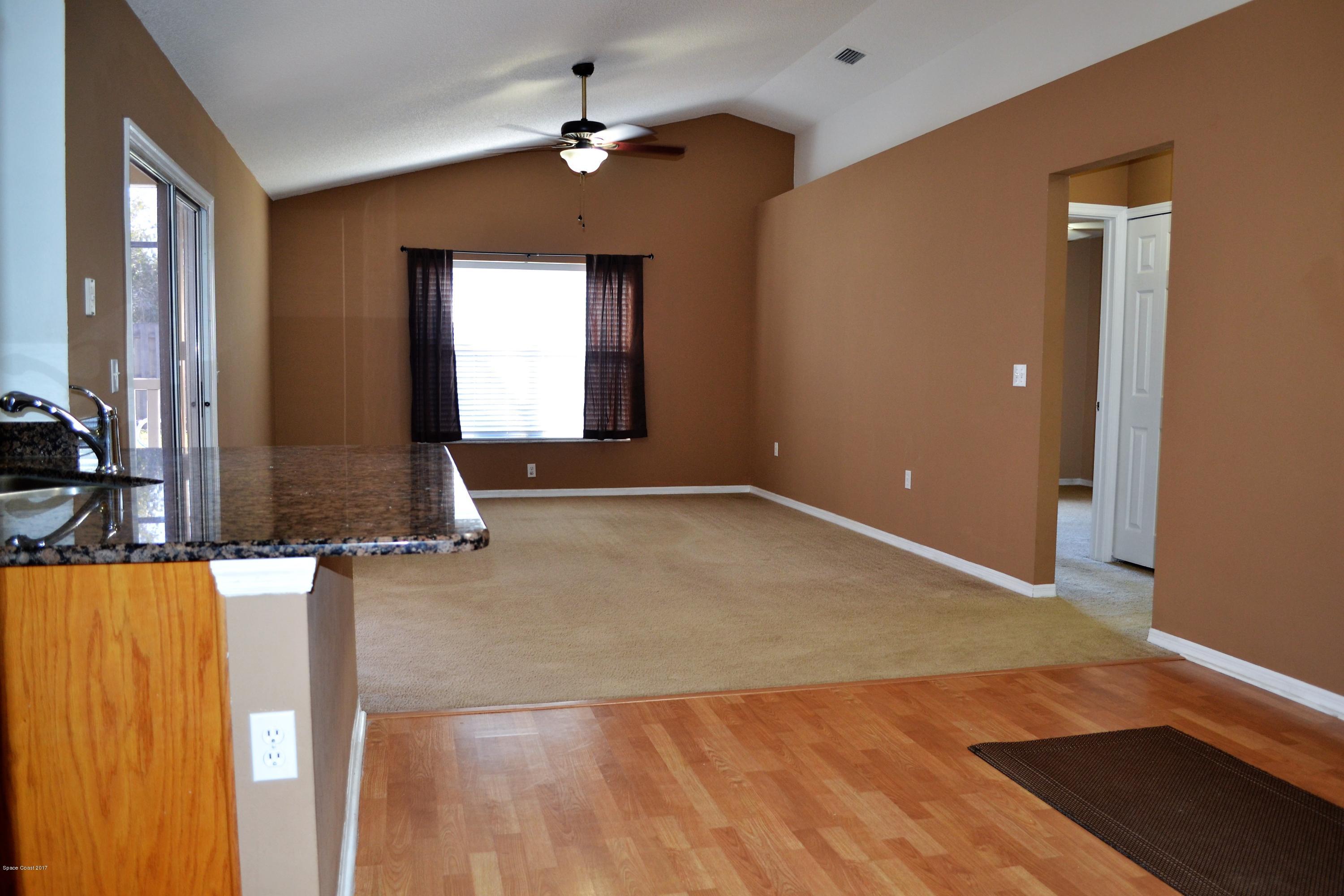 235 Twin Lakes Road Melbourne, FL 32901 - Photo 2 of 27 family area